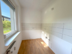Küche mit Fenster - Charmante 2-Raumwohnung mit guter Verkehrsanbindung